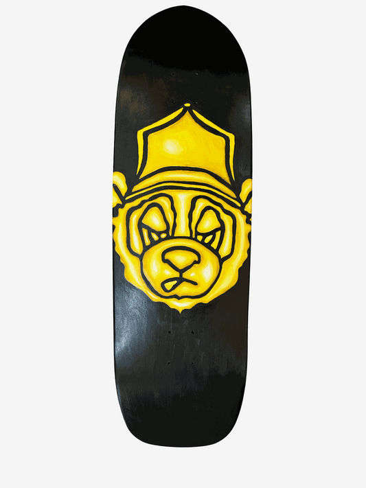 Hand painted skate deck featuring yellow bear logo on black background by Jabjab Rick
