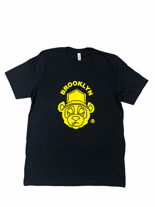 Black 100% cotton Jab Jab Bear Tee with yellow puff iconic bear logo and Brooklyn text.